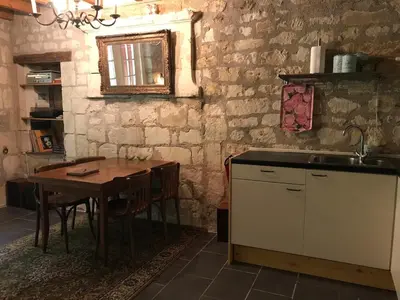 Cuisine ou kitchenette dans l'établissement Le Refuge des Châteaux