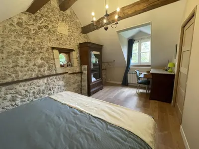 Un ou plusieurs lits dans un hébergement de l'établissement Gîte de charme aux portes d'Amboise avec grand jardin et Wi-Fi - FR-1-381-604