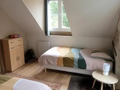 Un ou plusieurs lits dans un hébergement de l'établissement Gîte de charme aux portes d'Amboise avec grand jardin et Wi-Fi - FR-1-381-604