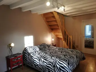 Un ou plusieurs lits dans un hébergement de l'établissement 8 seater house near Chinon