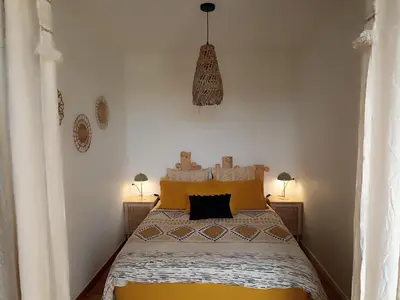 Un ou plusieurs lits dans un hébergement de l'établissement La petite maison à la campagne !
