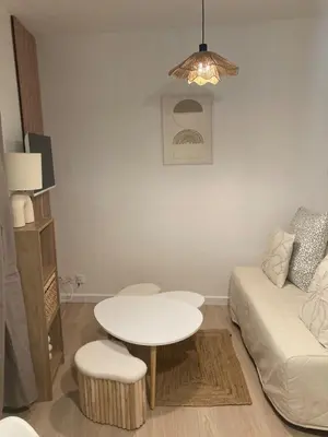 Coin salon dans l'établissement Studio Le nid charmant