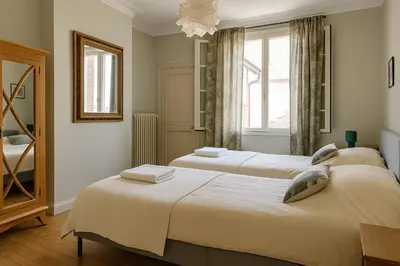 Un ou plusieurs lits dans un hébergement de l'établissement Les Maisons d'Amboise