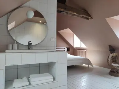 Un ou plusieurs lits dans un hébergement de l'établissement Les Maisons d'Amboise