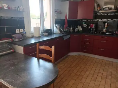 Cuisine ou kitchenette dans l'établissement maison proche du circuit du mans