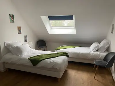 Un ou plusieurs lits dans un hébergement de l'établissement Duplex l Auvetia 150 m circuit 24 h