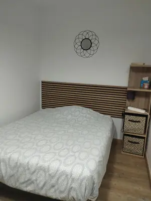 Un ou plusieurs lits dans un hébergement de l'établissement La room