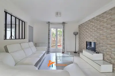 Coin salon dans l'établissement La Tuilerie - Family home