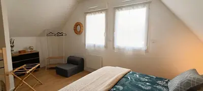 Un ou plusieurs lits dans un hébergement de l'établissement Gîte La Petite Lochoise