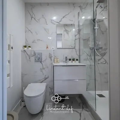 Salle de bains dans l'établissement Love au Mans - Sauna, Jacuzzi & Parking privé