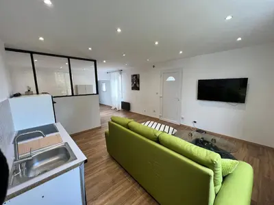 Cuisine ou kitchenette dans l'établissement Magnifique appartement