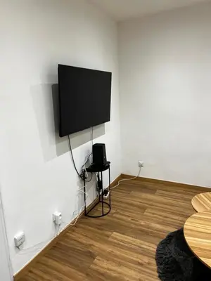 Télévision ou salle de divertissement dans l'établissement Magnifique appartement