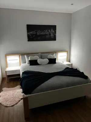 Un ou plusieurs lits dans un hébergement de l'établissement Magnifique appartement
