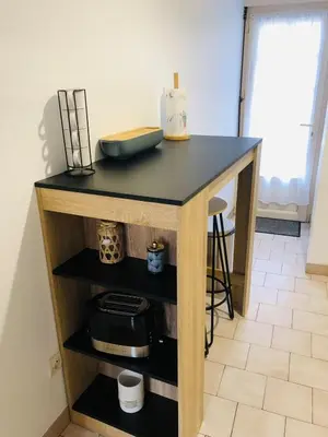 Cuisine ou kitchenette dans l'établissement Charmante maison de ville