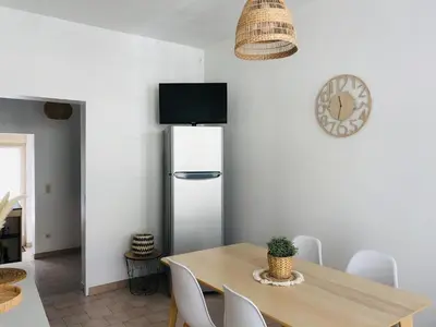 Cuisine ou kitchenette dans l'établissement Charmante maison de ville