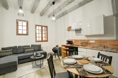 Coin salon dans l'établissement La cabane - A l Ombre des vieilles poutres