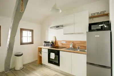 Cuisine ou kitchenette dans l'établissement Le Belvédère - Le rendez vous des Copains