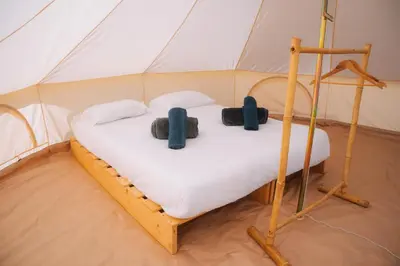 Un ou plusieurs lits dans un hébergement de l'établissement Silver - Glamping