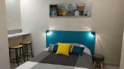 Un ou plusieurs lits dans un hébergement de l'établissement Jolie Studette au calme 10 min de Tours centre