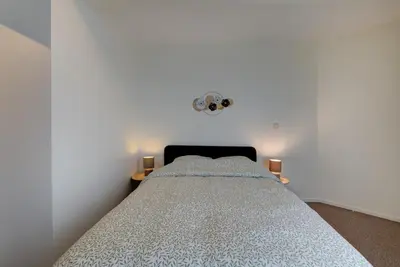 Un ou plusieurs lits dans un hébergement de l'établissement Appartement Cosy proche Gare