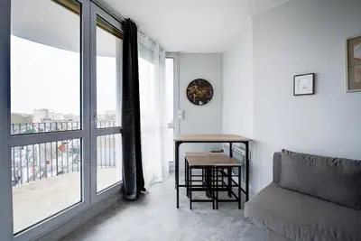 Coin salon dans l'établissement Appartement Cosy proche Gare