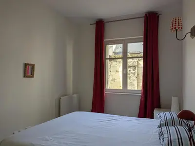 Un ou plusieurs lits dans un hébergement de l'établissement T2 Au pied du château sans vis à vis