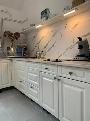 Cuisine ou kitchenette dans l'établissement La petite maison