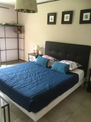 Un ou plusieurs lits dans un hébergement de l'établissement Madinina'S Cube