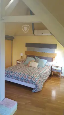 Un ou plusieurs lits dans un hébergement de l'établissement Appartement De La Vallée