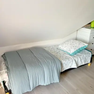 Un ou plusieurs lits dans un hébergement de l'établissement Chambres chez particulier