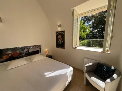 Un ou plusieurs lits dans un hébergement de l'établissement Appartement 