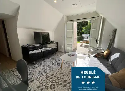 Télévision ou salle de divertissement dans l'établissement Appartement 