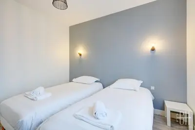 Un ou plusieurs lits dans un hébergement de l'établissement La Marnière, Maison avec jardin , 6 V, Parking