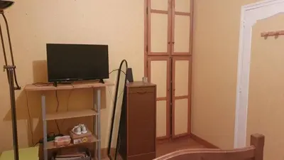 Télévision ou salle de divertissement dans l'établissement L'ébène - Chez L'habitant