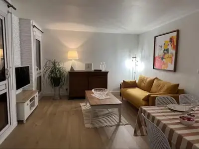 Télévision ou salle de divertissement dans l'établissement Appartement de la Famille Chat