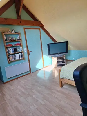 Télévision ou salle de divertissement dans l'établissement Chambres
