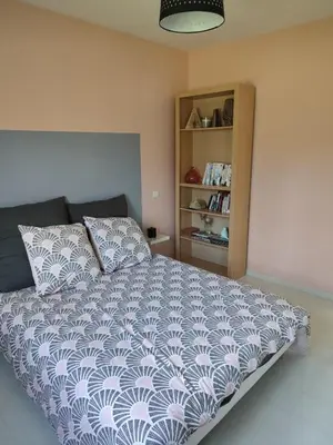 Un ou plusieurs lits dans un hébergement de l'établissement 2 chambres à la campagne, proche du Mans