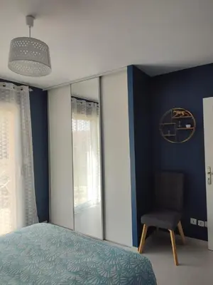 Un ou plusieurs lits dans un hébergement de l'établissement 2 chambres à la campagne, proche du Mans