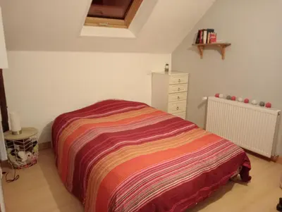 Un ou plusieurs lits dans un hébergement de l'établissement chambre d'hôtes au cœur de la nature