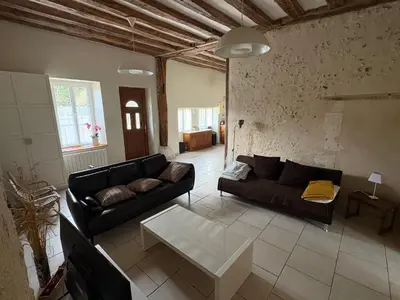 Coin salon dans l'établissement le Gite de la Bergerie