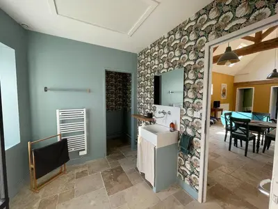 Cuisine ou kitchenette dans l'établissement Ancienne grange rénové et cozy le long de la rivière du Cher