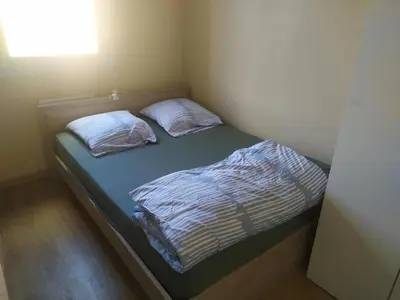 Un ou plusieurs lits dans un hébergement de l'établissement Studette COSY 2 couchages proche TOURS