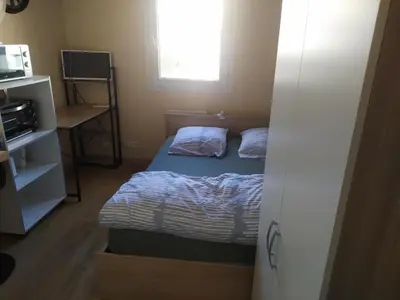 Un ou plusieurs lits dans un hébergement de l'établissement Studette COSY 2 couchages proche TOURS