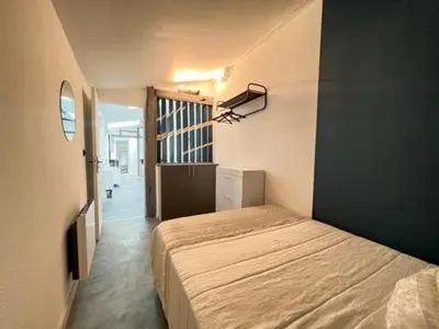 Un ou plusieurs lits dans un hébergement de l'établissement Le Petit Rive Gauche - Blois