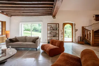 Coin salon dans l'établissement Le Clos des Moriers 2 hours from Paris-Piscine-12 pers