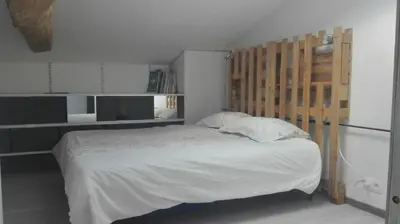 Un ou plusieurs lits dans un hébergement de l'établissement Maison rénovée dans un corps de ferme