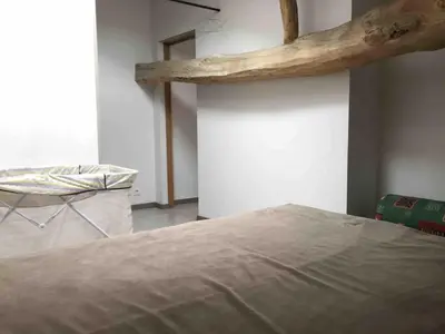 Un ou plusieurs lits dans un hébergement de l'établissement Maison rénovée dans un corps de ferme