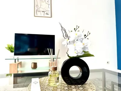 Télévision ou salle de divertissement dans l'établissement L Archipel Le Mans Est Pontlieue