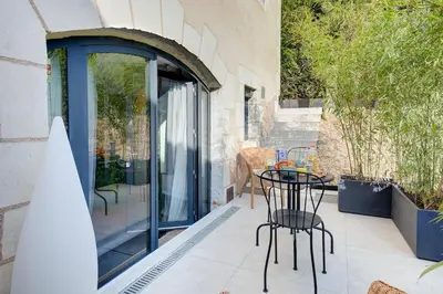 Balcon ou terrasse dans l'établissement L'Inséparable - Jacuzzi - Terrasse - Parking - Vélos
