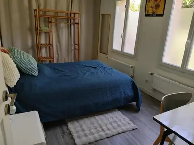 Un ou plusieurs lits dans un hébergement de l'établissement Bienvenue à la maison !
